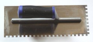 Adhesive trowel