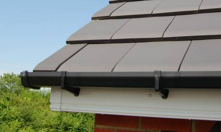 Gutter fixed to fascia board